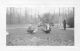 Gerald Donnelly playing with a chicken and Arthur Olsen - Unknown Date